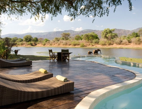 10 enticing pools that you wanna jump into,hanging gardens ubud hotel,neptune pool at the hearst castle in san simeon,california,the library pool in koh samui,thailand,cambrian pool,switzerland,bali,bali,infinity pool,singapore,st. regis in lhasa,tibet,chongwe river house pool,africa,belmond jimbaran puri resort,the san alfonso del mar seawater pool,chile,golden nugget pool in las vegas,nevada