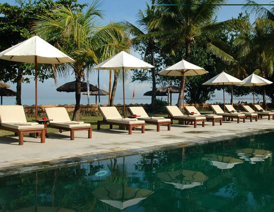 10 enticing pools that you wanna jump into,hanging gardens ubud hotel,neptune pool at the hearst castle in san simeon,california,the library pool in koh samui,thailand,cambrian pool,switzerland,bali,bali,infinity pool,singapore,st. regis in lhasa,tibet,chongwe river house pool,africa,belmond jimbaran puri resort,the san alfonso del mar seawater pool,chile,golden nugget pool in las vegas,nevada