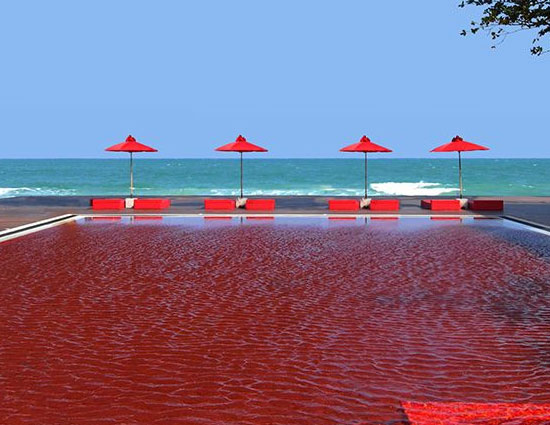 10 enticing pools that you wanna jump into,hanging gardens ubud hotel,neptune pool at the hearst castle in san simeon,california,the library pool in koh samui,thailand,cambrian pool,switzerland,bali,bali,infinity pool,singapore,st. regis in lhasa,tibet,chongwe river house pool,africa,belmond jimbaran puri resort,the san alfonso del mar seawater pool,chile,golden nugget pool in las vegas,nevada