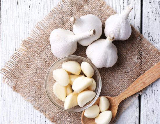 health benefits,5 amazing health benefits of garlic,garlic,garlic as medicine,weight gainer,immune system,vitamin c,treating cardiovascular disease,fungal and vaginal infection
