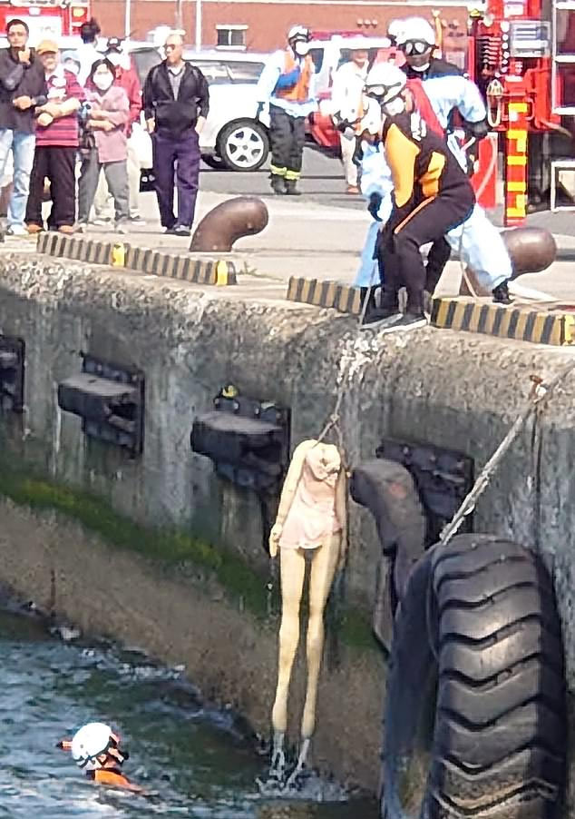 japan,rescue team,drowning woman,japanese harbour,sex doll