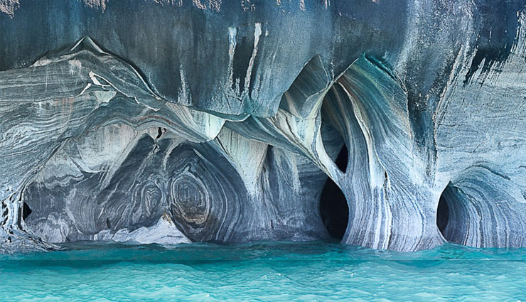 most beautiful caves of the world,world tourism,caves,langjokull ice cave,benagil sea cave,the marble caves,mendenhall ice caves,reed flute cave,ellison’s cave