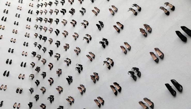 weird news,weird ides,weird way to tribute,artist displays 440 pairs of heels,domestic violence