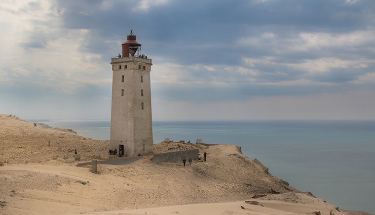 abandoned buildings devoured by sand,rubjerg knude lighthouse,denmark,the buildings of the abandoned town of kolmanskop,namibia,tilsandede kirke,denmark,houses in the village of araouane,mali,mosque minaret,egypt