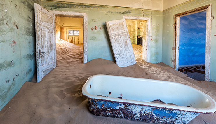 abandoned buildings devoured by sand,rubjerg knude lighthouse,denmark,the buildings of the abandoned town of kolmanskop,namibia,tilsandede kirke,denmark,houses in the village of araouane,mali,mosque minaret,egypt