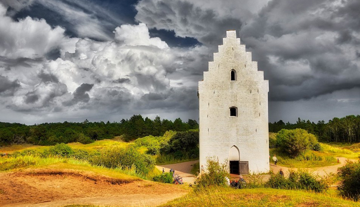 abandoned buildings devoured by sand,rubjerg knude lighthouse,denmark,the buildings of the abandoned town of kolmanskop,namibia,tilsandede kirke,denmark,houses in the village of araouane,mali,mosque minaret,egypt
