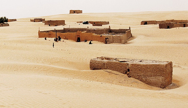 abandoned buildings devoured by sand,rubjerg knude lighthouse,denmark,the buildings of the abandoned town of kolmanskop,namibia,tilsandede kirke,denmark,houses in the village of araouane,mali,mosque minaret,egypt