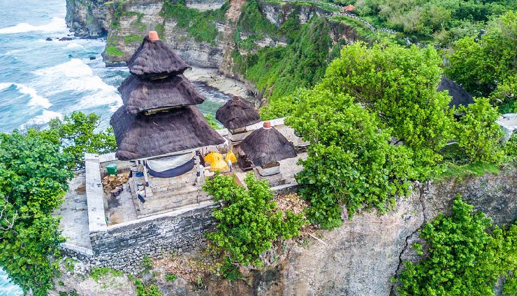 bali travel guide,bali tourism,things to do in bali,explore ubud,tanah lot temple,mount batur hike,bali hot springs,uluwatu temple,surfing in bali,besakih temple,tukad cepung waterfall,sundays beach club,bali swing