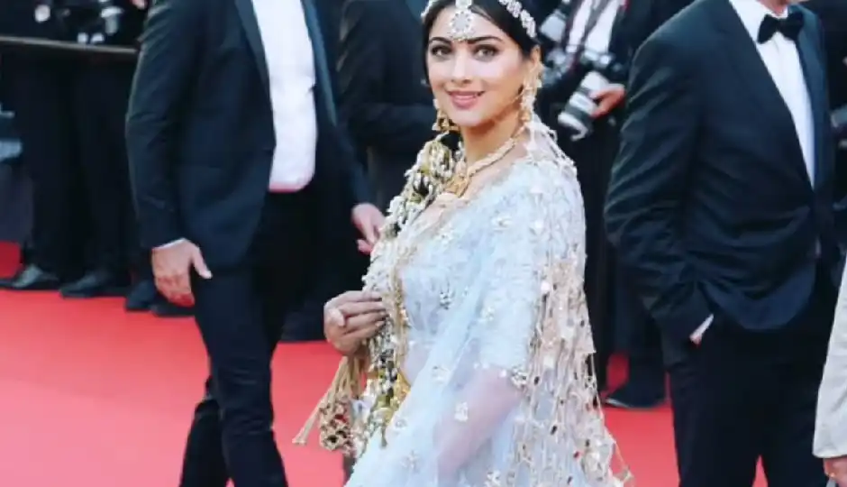 cannes film festival 2026,anjali fogat,premanand maharaj,red carpet fashion,indian culture at cannes,sanatan dharma,bollywood fashion news,urvashi rautela cannes,spiritual fashion statement,celebrity style cannes