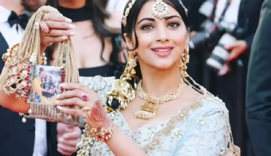 cannes film festival 2026,anjali fogat,premanand maharaj,red carpet fashion,indian culture at cannes,sanatan dharma,bollywood fashion news,urvashi rautela cannes,spiritual fashion statement,celebrity style cannes