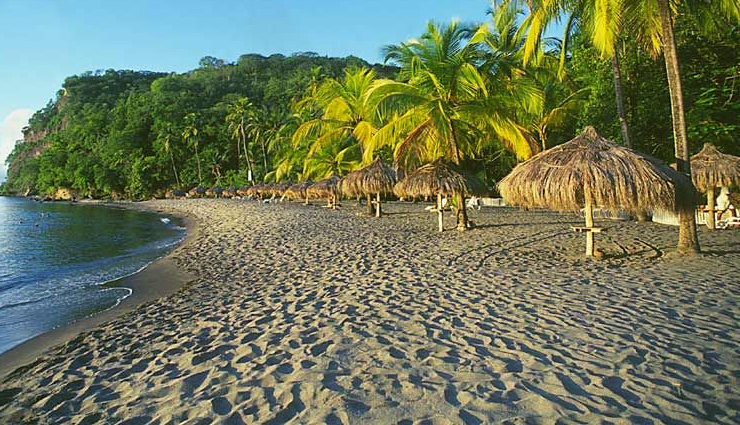 black sand beaches,black sand beaches to visit,10 black sand beaches,black sands beach in whitethorn,ficogrande in stromboli,perissa beach in paralia,santorini,stokksnes beach in iceland,miho beach in shimizu,punaluu beach on the big island of hawaii,anse chastanet in saint lucia,kamari beach in santorini,greece,papenoo beach in papenoo,tahiti,reynisfjara in vík í mýrdal,travel,holidays,travel guide