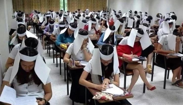 weird teacher,weird news,weird idea,cardboard boxes to students,uses cardboard to stop cheating