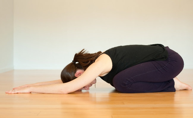 yoga poses to boost fertility,yoga asan,tips to boost fertility,paschimottanasana,hastapadasana,baddha konasana,viparita karani,balasna