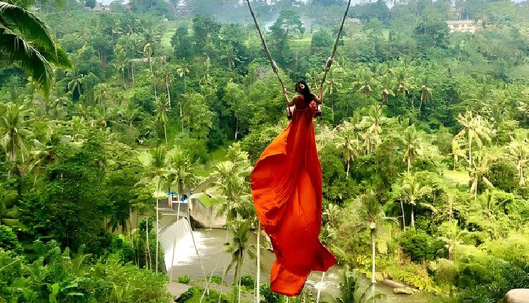 bali travel guide,bali tourism,things to do in bali,explore ubud,tanah lot temple,mount batur hike,bali hot springs,uluwatu temple,surfing in bali,besakih temple,tukad cepung waterfall,sundays beach club,bali swing