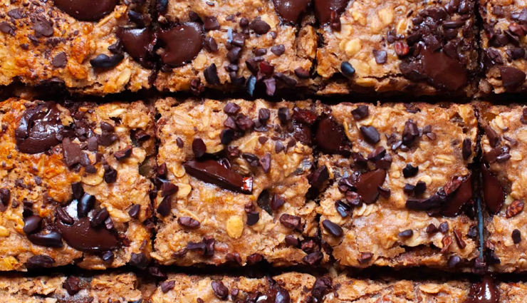 banana oatmeal bars,chocolate cardamom oatmeal bars,blissful oatmeal bars recipe,healthy snack bars with banana and chocolate,cardamom flavored oatmeal bars,easy oatmeal bars recipe,wholesome breakfast bars,delicious dessert bars,homemade banana chocolate bars,quick and tasty oatmeal bars