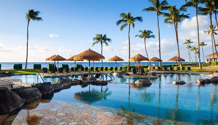 beach wedding destinations around the world,anantara dhigu resort,guana island in the british virgin islands,sheraton kauai,atlantis paradise island in the bahamas,hayman island,chapel on stilts in bora bora,romantic antigua