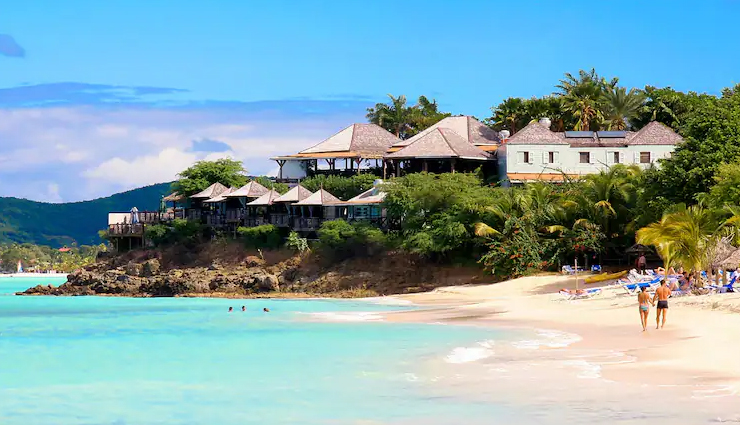 beach wedding destinations around the world,anantara dhigu resort,guana island in the british virgin islands,sheraton kauai,atlantis paradise island in the bahamas,hayman island,chapel on stilts in bora bora,romantic antigua