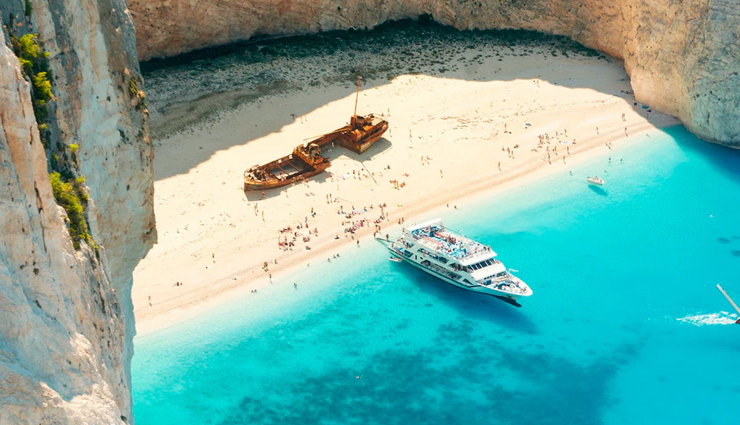 matira beach,french polynesia,grace bay beach,turks and caicos islands,camps bay beach,cape town,railay beach,thailand,miami beach,florida,shipwreck beach,greece,beautiful beaches,beaches to visit in the world