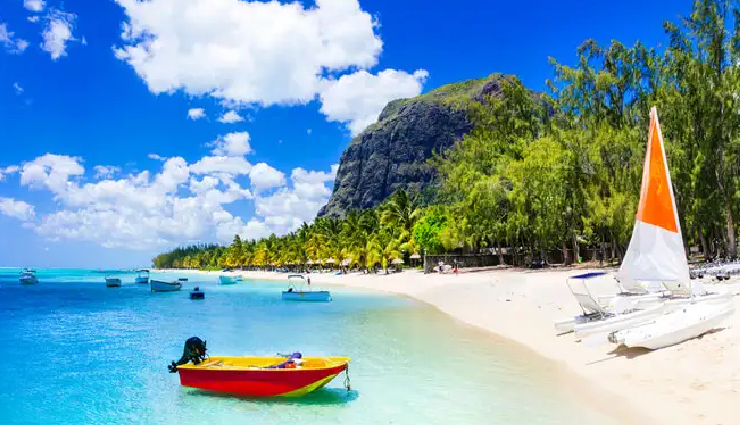 reasons why choose mauritius honeymoon,mauritius honeymoon,luxury hotels,adventure sports,mauritian cuisine,street food,picture-perfect moments,breathtaking beaches,turquoise lagoons,romantic experience,couple massages,tropical paradise,romantic destinations,scenic landscapes,natural beauty,honeymoon activities,scuba diving in mauritius,skydiving adventures,golfing in mauritius,cultural fusion,chinese cuisine,european flavors,indian spices,exotic street food,doll puri,chicken curry,street food delights,memorable photography,captivating backdrops,warm blue waters,romantic sunset strolls,dreamy beach experiences,idyllic travel destination