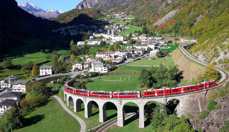 scenic rail routes in switzerland,swiss holiday rail journeys,glacier express switzerland,bernina express unesco,goldenpass line landscapes,wilhelm tell express itinerary,jungfrau express panoramic view,switzerland tour package,swiss vacation destinations,rail journeys through swiss landscapes,swiss rail travel experiences,spectacular views on swiss trains,swiss alps train routes,swiss railway adventures,switzerland sightseeing by train,swiss travel highlights,unesco world heritage rail journeys,scenic beauty of swiss railways,swiss holiday destinations by rail,best train routes in switzerland
