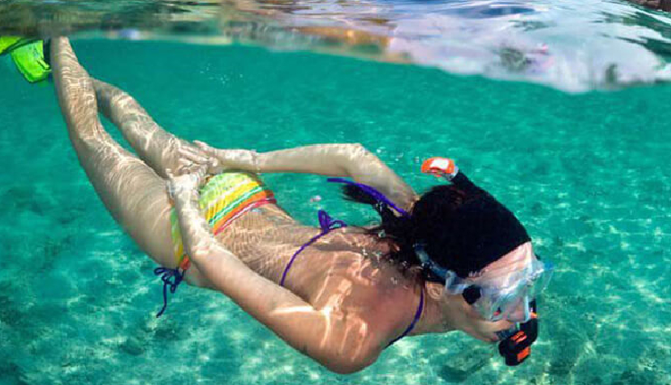 mauritius travel experiences,things to do in mauritius,explore mauritius attractions,adventure activities mauritius,belle mare water sports,deep sea fishing mauritius,le morne brabant hike,grand bassin temples visit,seven coloured earth tour,underwater waterfall helicopter tour