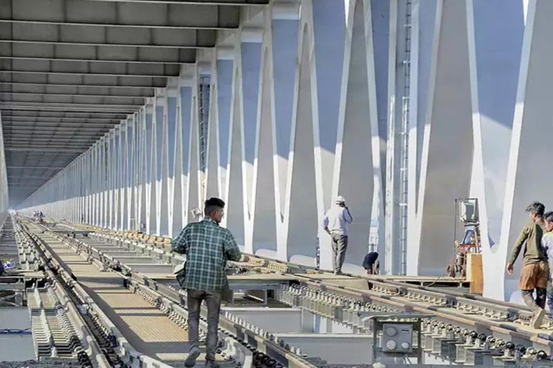 pm narendra modi,bogibeel bridge,india,rail road bridge,inaugurate,assam,arunachal pradesh,longest rail-road bridge
