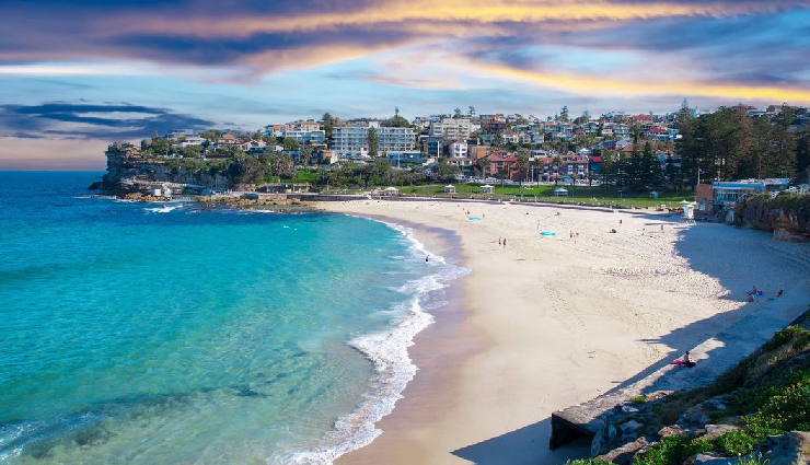 australia travel experiences,must-visit attractions australia,tourist destinations australia,exciting things to do australia,sydney tourist spots,melbourne cultural scene,pink lake australia,wildlife encounters australia,great barrier reef adventures,skydiving in australia