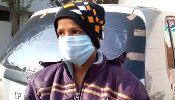 uttar pradesh,muzaffarnagar,boy,sleeping,dog,footpath,news