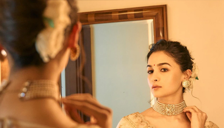 bollywood navratri hairstyles,navratri 2024 hairstyles,kriti sanon ponytail hairstyle,ananya panday side-parted lob,alia bhatt navratri hairstyle,sonam kapoor high bun,janhvi kapoor messy bun,kiara advani fishtail braid,mouni roy pigtail braids,festive hairstyles,bollywood inspired hairstyles,ethnic hairstyles,navratri hair ideas,easy navratri hairstyles