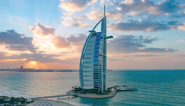 wonder buildings built on water,burj al arab,our lady of the rocks,veluwemeer aqueduct,venetian islands,punta della dogana,jal mahal,pampus,peberholm,deeg water palace,kansai airport,ile aux cygnes,travel,travel tips,holidays,travel guide