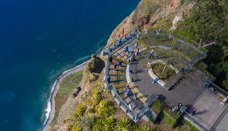 madeira island tourist attractions,funchal madeira attractions,pico do arieiro madeira,cabo girao madeira,monte palace tropical garden,valley of the nuns madeira,porto moniz natural pools,laurisilva of madeira forest,machico madeira sights,ponta do sol madeira landmarks