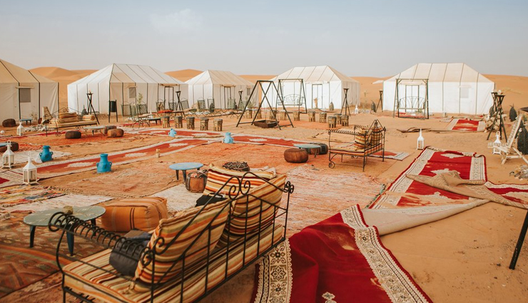 camping vacation destination around the world,sahara desert in morocco,mount cook national park in new zealand,nubra valley ladakh in india,devon in england,yellowstone national park in the usa