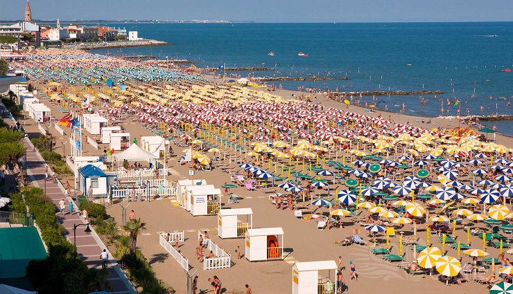 venice beaches,lido di venezia beach,caorle coastal town,bau beach di caorle dog-friendly,alberoni beach hidden gem,cavallino beach blue flag,ponente and levante beaches,coastal attractions near venice,beach vacation in venice,romantic retreat in venice,venetian coastline,italian seaside escapes,venice beach resorts,sandy beaches in venice,coastal relaxation in venice