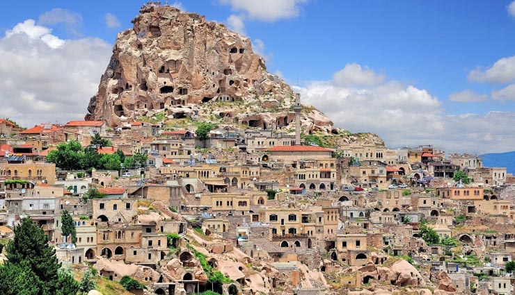5 strangest places were people own house will shock you,roussanou monastery,greece,hanging monastery,china,setenil de las bodegas,spain,al azra,yemen,cappadocia,turkey