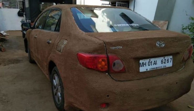cow dung,car covered cow dung,cow dung to keep car cool,weird story,omg ,गर्मी से बचने के लिए लाखों की कार पर कर दी गोबर की कोटिंग,गुजरात,अहमदाबाद