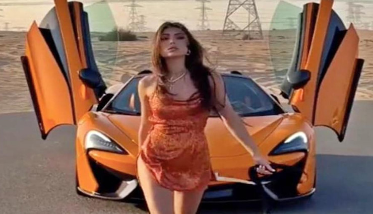 8 करोड़ की कार को पालतू कुत्ते की तरह सड़क पर टहलाती नजर आई ये मॉडल, देखे वीडियो