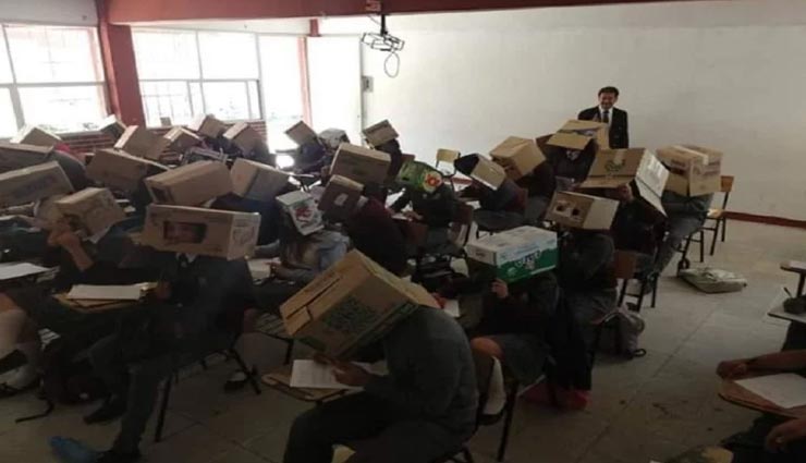 weird teacher,weird news,weird idea,cardboard boxes to students,uses cardboard to stop cheating ,अनोखा शिक्षक, अनिखी खबर, अनोखा आईडिया, चीटिंग रोकने का अनोखा तरीका, मेक्सिको, कार्डबोर्ड बॉक्स से  चीटिंग रोकना