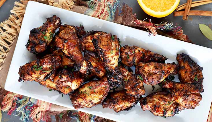 caribbean dishes,must try caribbean dishes,ackee and saltfish from jamaica,jamaican jerk chicken,sweet coconut drops,goat water,crab and callaloo