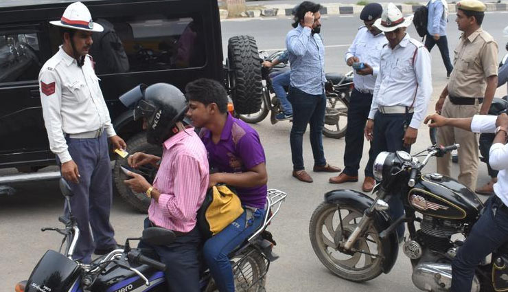 surat garba group,road safety,new traffic rules,new mv act,navratra,gujarat news,garba with helmet,garba performance,news,weird news in hindi