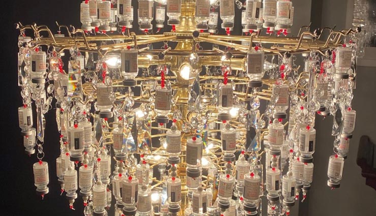 weird news,weird incident,chandelier by covid vaccine bottles