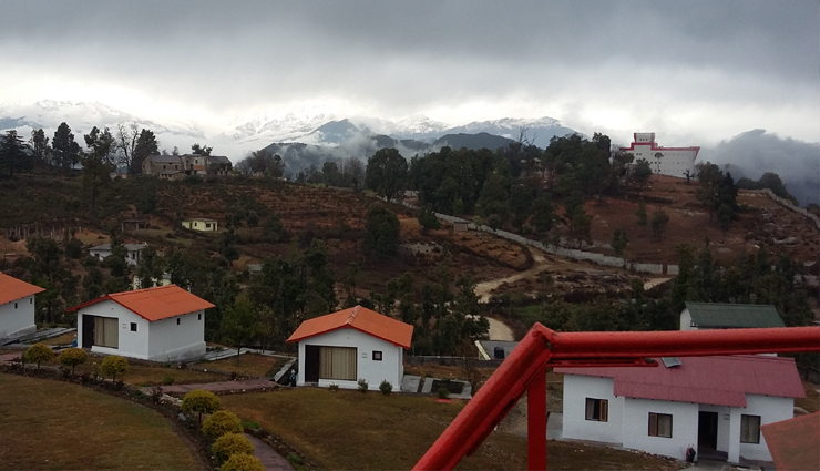 must visit places in uttarakhand,uttarakhand tourism,best places to visit in uttarakhand,auli skiing,chopta valley trekking,binsar wildlife,ranikhet winter getaway,munsiyari adventure,chamba scenic views,khirsu hiking,chaukori tea plantations,almora cultural significance,dhanaulti snowfall,nainital winter destination,rishikesh spiritual retreat,haridwar pilgrimage,jim corbett safari,kausani himalayan views