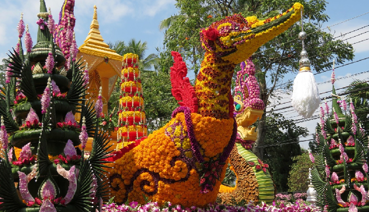 chiang mai flower festival attractions,reasons to visit chiang mai flower festival,highlights of chiang mai flower festival,chiang mai floral extravaganza,flower parade chiang mai,cultural events in chiang mai,chiang mai festival tourism,must-see at chiang mai flower festival,exploring chiang mai floral beauty,traveling to chiang mai for the flower festival