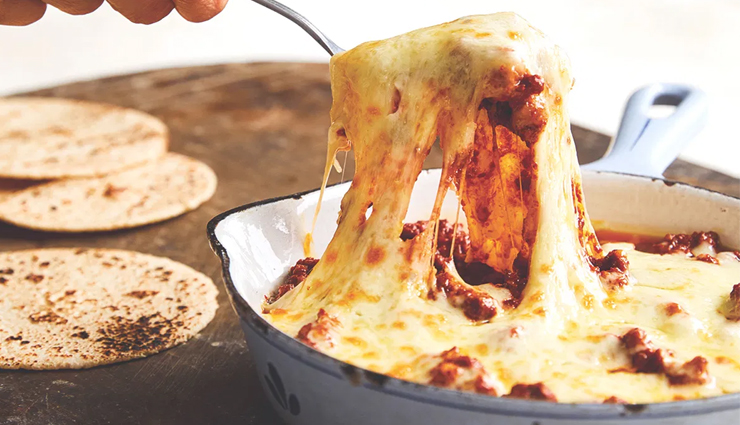 chile,famous food for chile,chile food,curanto,chorillana,sopaipillas,empanada de pino,milcao,pastel de jaiba,machas a la parmesana,choriqueso,chancho en piedra,chumbeque,travel,holidays,travel guide