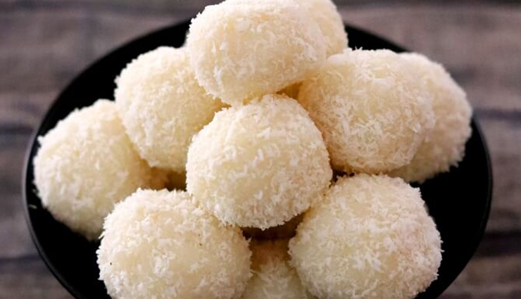 south indian sweet balls,coconut ladoo recipe,delicious coconut ladoo,irresistible sweet balls,south indian dessert,coconut ladoo preparation,easy coconut ladoo recipe,traditional indian sweet,festive coconut ladoo,grated coconut dessert