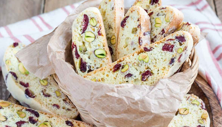 cranberry pistachio biscotti recipe,crunchy biscotti for every occasion,italian cookie with cranberries and pistachios,twice-baked biscotti delight,easy-to-make biscotti with cranberry and pistachio,nutty and tangy biscotti recipe,perfect pairing with hot beverages,festive and versatile biscotti treat,homemade gift idea - cranberry pistachio biscotti,irresistible crunch in every bite