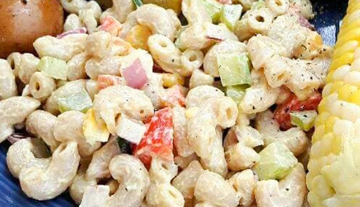 easy creamy pasta salad recipe,creamy pasta salad with feta and veggies,simple pasta salad with creamy dressing,quick and delicious pasta salad,creamy summer pasta salad,easy cold pasta salad recipe,creamy pasta salad for picnics,creamy mayo and yogurt pasta salad,quick pasta salad with fresh ingredients,effortless pasta salad with tangy dressing