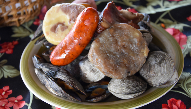 chile,famous food for chile,chile food,curanto,chorillana,sopaipillas,empanada de pino,milcao,pastel de jaiba,machas a la parmesana,choriqueso,chancho en piedra,chumbeque,travel,holidays,travel guide