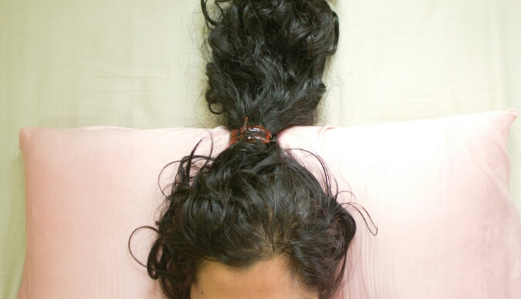 sleeping tips for curly hair,curly hair care,how to sleep with curly hair,protect curls while sleeping,loose bun for curls,pineapple method for curls,t-shirt turban for curly hair,silk pillowcase benefits,satin bonnet for hair,curly hair maintenance tips,reduce frizz curly hair,overnight curly hair care,prevent damaged curls,hair protection while sleeping