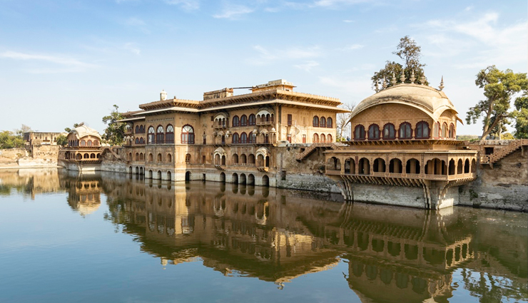 wonder buildings built on water,burj al arab,our lady of the rocks,veluwemeer aqueduct,venetian islands,punta della dogana,jal mahal,pampus,peberholm,deeg water palace,kansai airport,ile aux cygnes,travel,travel tips,holidays,travel guide