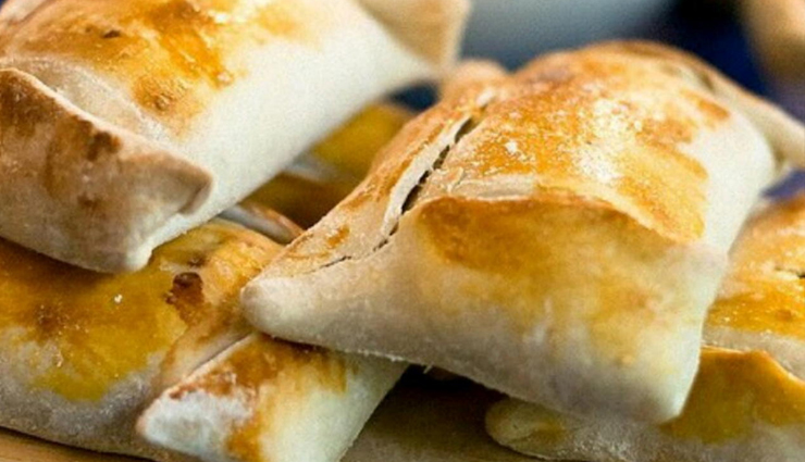 chile,famous food for chile,chile food,curanto,chorillana,sopaipillas,empanada de pino,milcao,pastel de jaiba,machas a la parmesana,choriqueso,chancho en piedra,chumbeque,travel,holidays,travel guide
